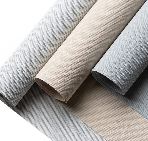 Rolls of London screen fabric in grey and sand
